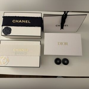 CHANEL Black and Gold Ribbon with Flower Accent